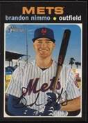 A baseball player holding a bat

Description automatically generated