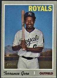 A baseball player holding a bat

Description automatically generated with medium confidence