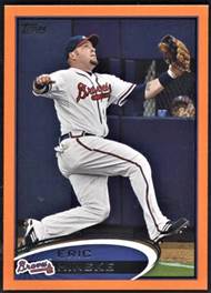 A baseball player throwing a baseball

Description automatically generated