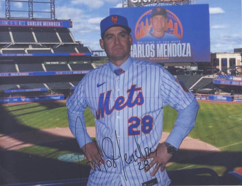 A person in a baseball uniform

Description automatically generated
