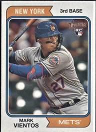 A baseball player holding a bat

Description automatically generated